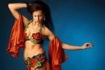 Belly dancer dancing on stage.